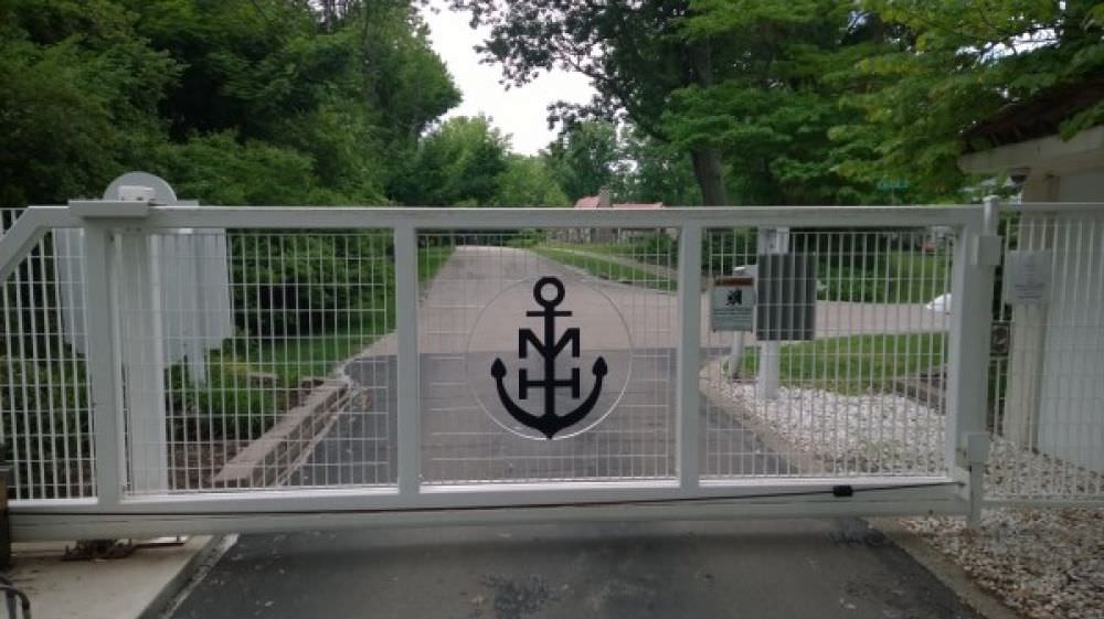 METRO DESIGN GALVANIZED STEEL CANTILEVER MONORAIL GATE  AT THE MENTOR HARBOR YATCH CLUB 